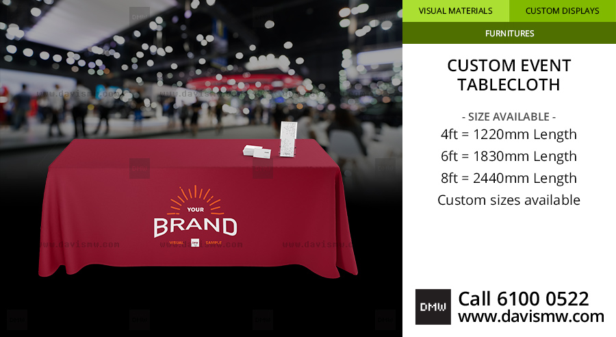 Red custom event tablecloth with logo branding at a trade show – Davis Materialworks